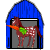 The spotted horse lives in the blue barn. He is eating a carrot.